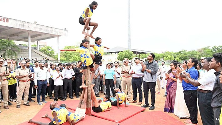TN Minister Aadhav Arjuna along with MLA R. Abhishek and officials inspecting the synthetic hockey stadium construction site in Tiruvannamalai on June 12 2026.