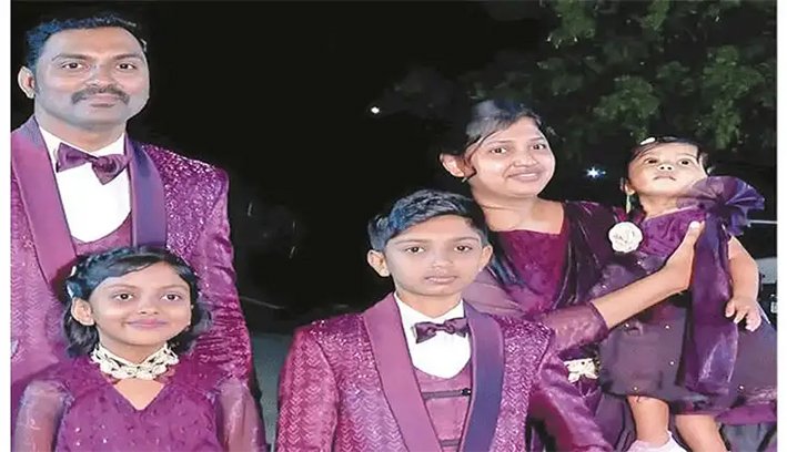 A happy family celebrating the unique world record of three siblings of different ages sharing the exact same birth date in June 2026.