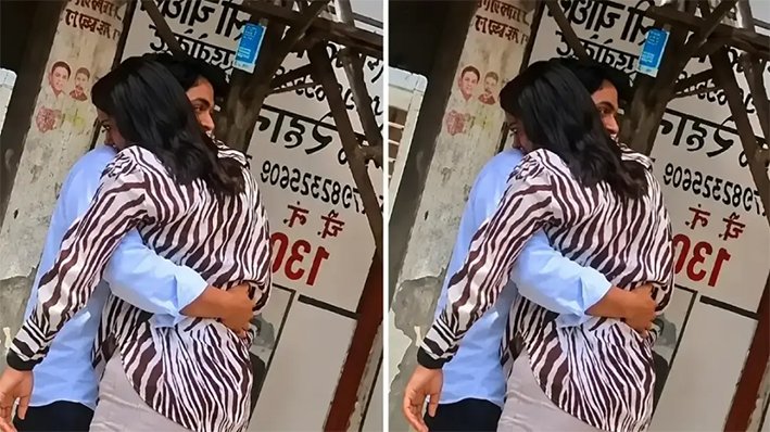 A young Indian couple happily smiling together as they tear up legal documents or a petition inside a bright courthouse corridor in June 2026.