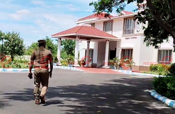 High-ranking police inspectors and sub-inspectors walking into the CBI office building for questioning regarding the Karur incident on June 12 2026.
