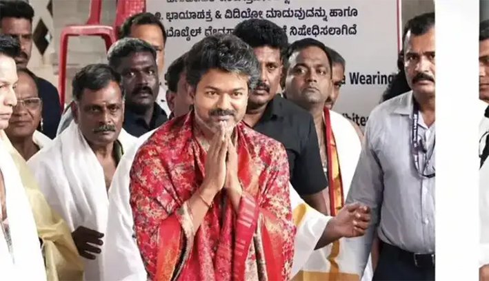 Tamil Nadu Chief Minister Vijay receiving traditional welcome from priests during his visit to the historic Kollur Mookambika Temple on June 12 2026.
