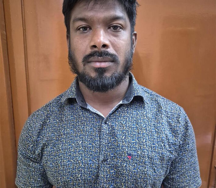 விசாரணைக்கு சென்ற காவலரை மிரட்டிய வாலிபர் கைது