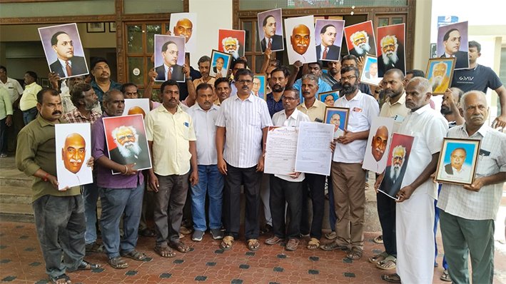 அரசு அலுவலகத்தில் அண்ணா உள்ளிட்ட தலைவர்களின் படங்களை வைக்க கோரிக்கை